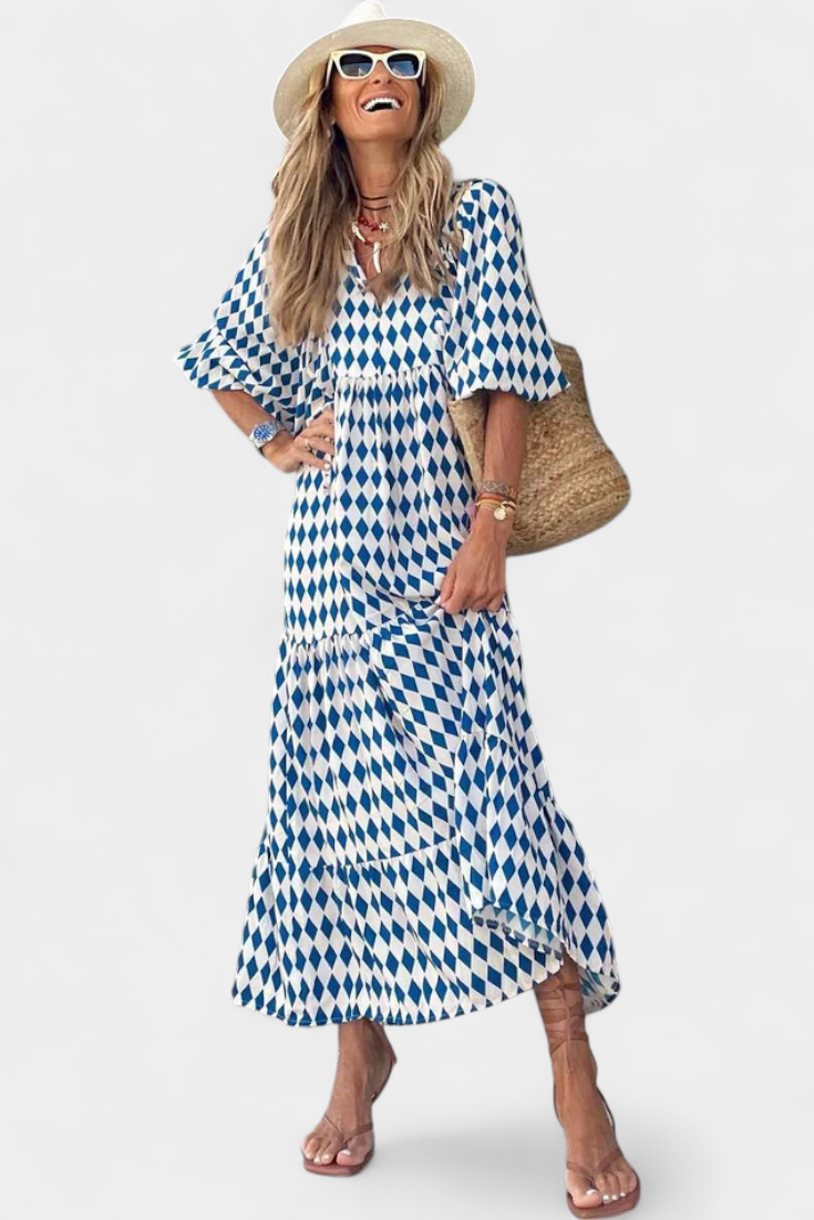 Aroa – Vestido boho com estampa artística e silhueta fluida
