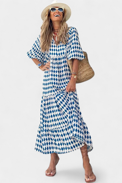 Aroa – Vestido boho com estampa artística e silhueta fluida