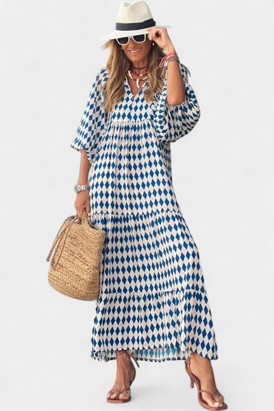 Aroa – Vestido boho com estampa artística e silhueta fluida