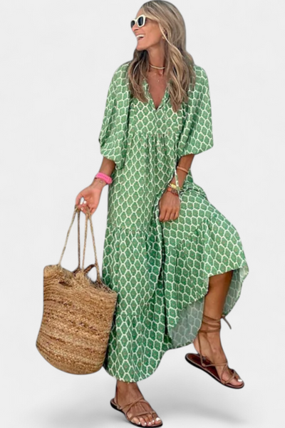 Aroa – Vestido boho com estampa artística e silhueta fluida